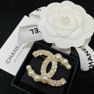 Chanel gold brooch